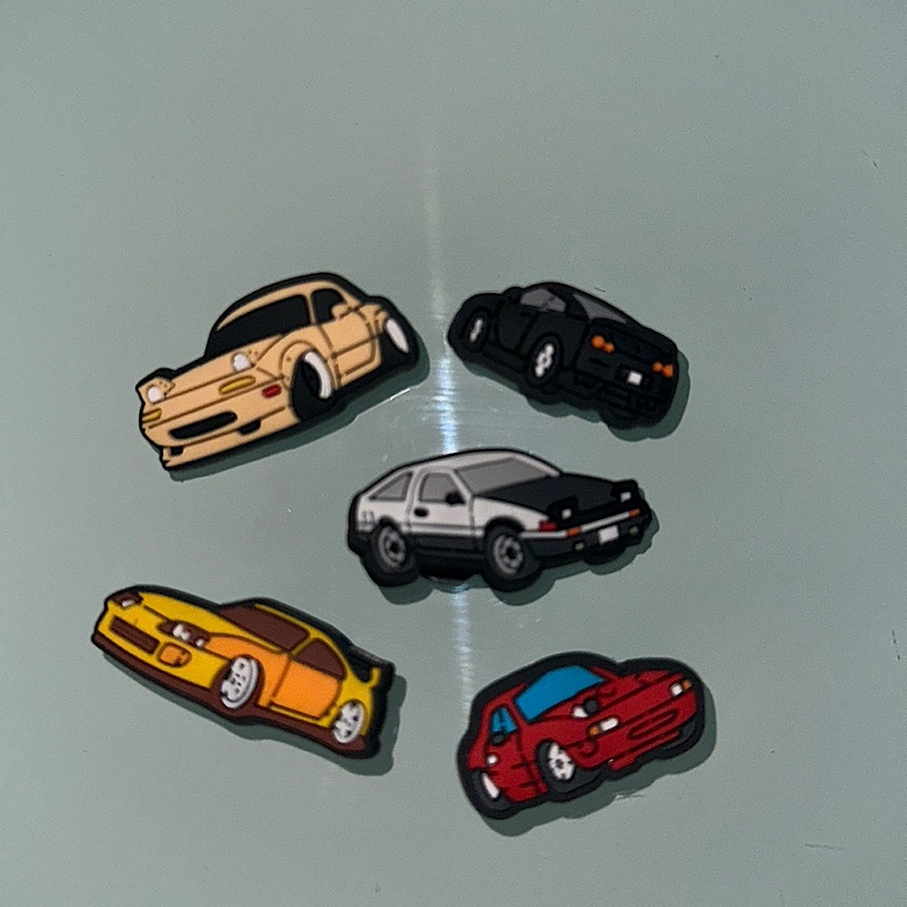 Croc shoe charms/Jibbitz designed to personalize your favorite Crocs.